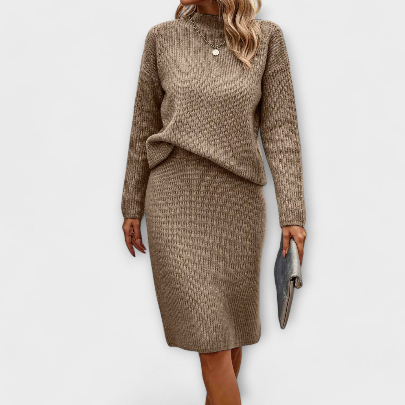 Complete with sweater and two-piece skirt